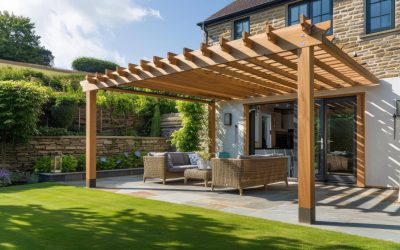 A pergola in the courtyard of a house, with garden furniture